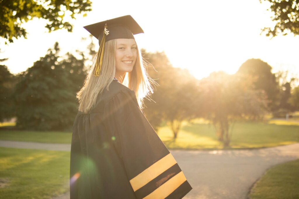 a person wearing a graduation cap and gown